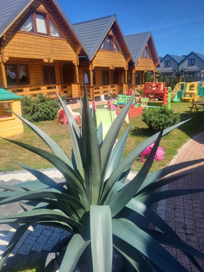 Domki Letniskowe Paradise Rewal Bagian luar foto